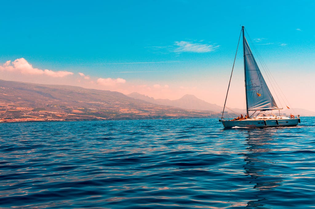 Sailboat at anchor in calm water